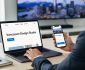 “A Vancouver small business owner reviewing a responsive website on a laptop and smartphone at a desk in soft natural light.”